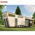 Bepergian Tiny Prefab House On Wheels Resort Rumah Trailer Kayu Prefabrikasi